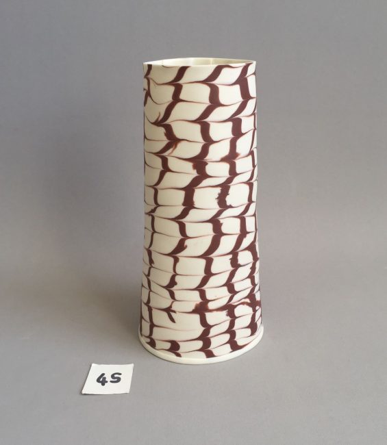#45 brown feathered taper